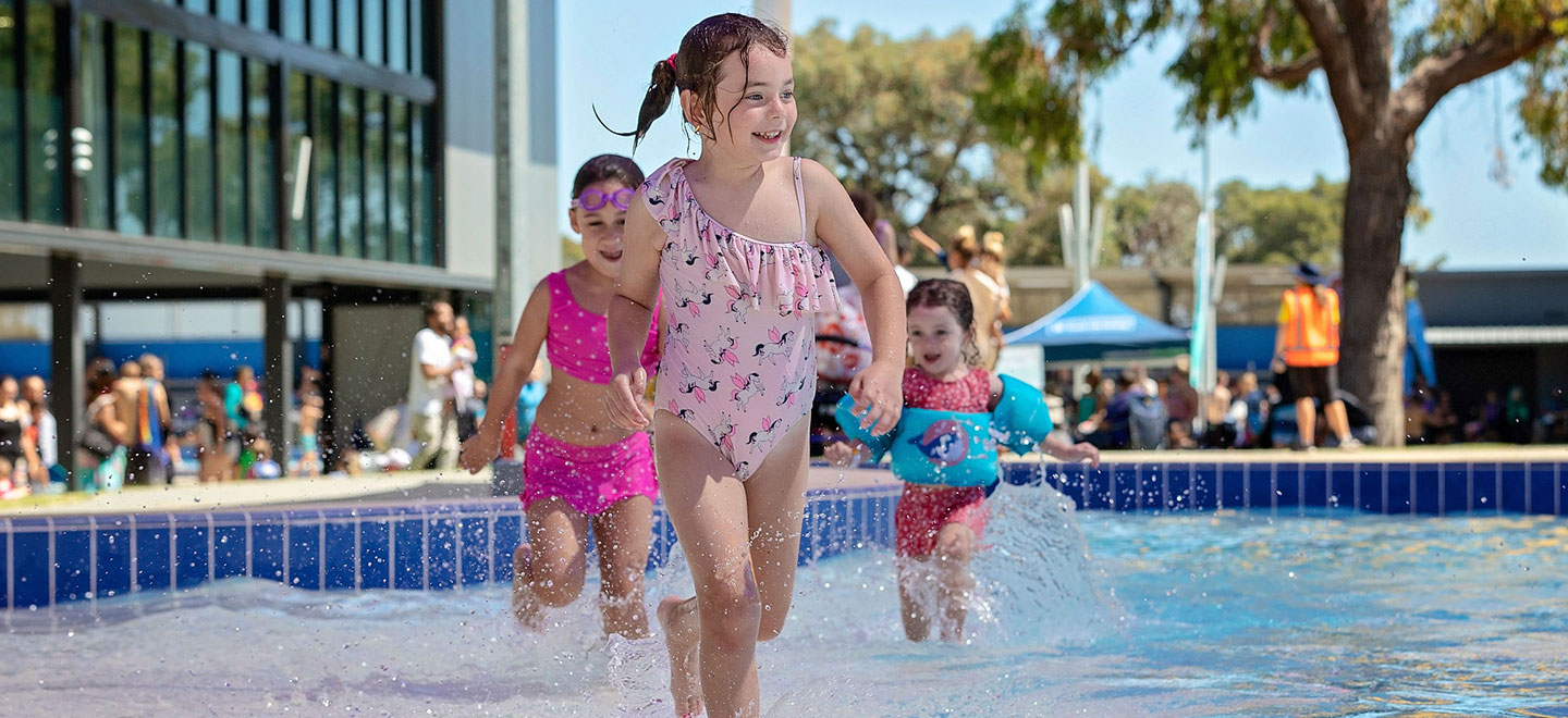 kids playing in outdoor aquatic area